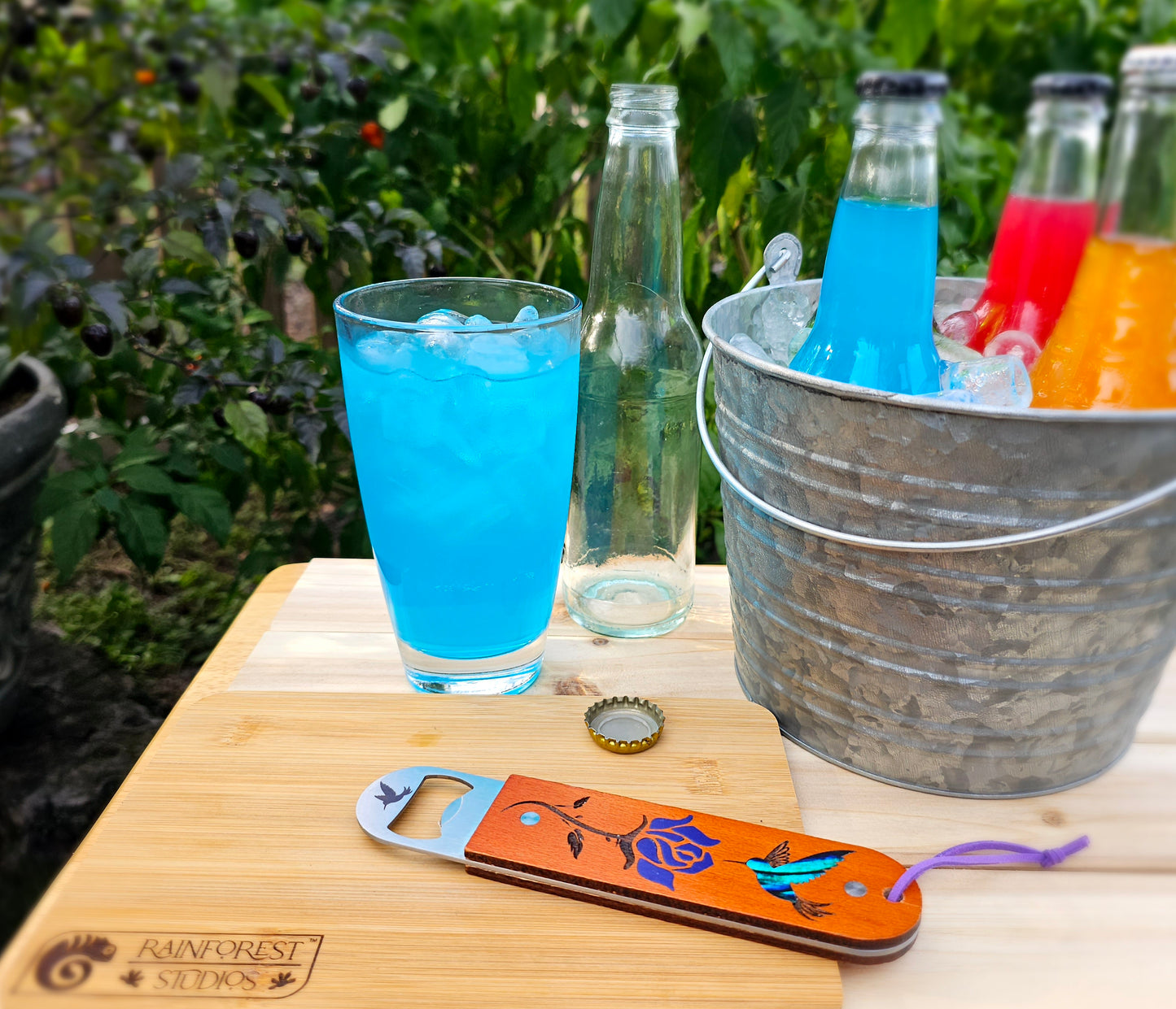 Custom Hummingbird And Rose Acrylic Inlaid Bottle Opener || Great addition to any bar, kitchen, or as a unique gift.